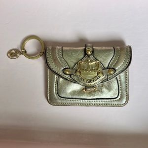 Gold Juicy Couture change purse.